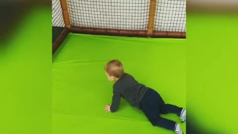 Collab copyright protection - baby boy kicks ball faceplants goal