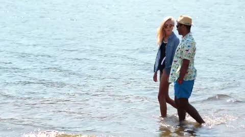 Couple walking on the beach