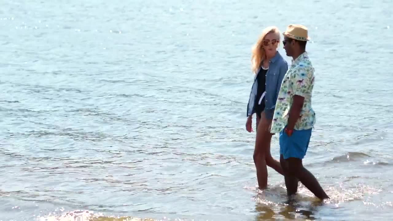 Couple walking on the beach