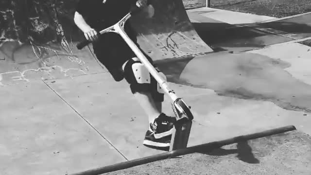 Collab copyright protection - boy on scooter halfpipe grayscale