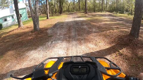 Riding the Can Am 570 four-wheeler.