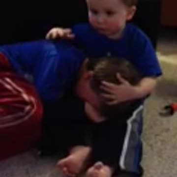 Tot Boy Consoles Older Brother Crying Over Mario
