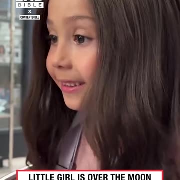 Young child happy about new realistic wig ❤️