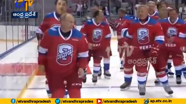 PUTIN Russia's President falls on ice after hockey match !!