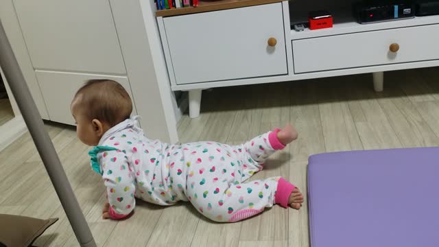 Baby crawling forward