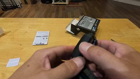 Black diamond storm 400 installing the batteries