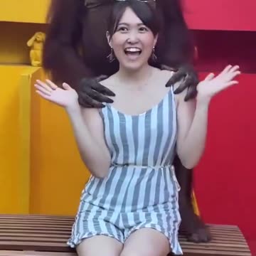 Orangutan Gropes Young Tourist