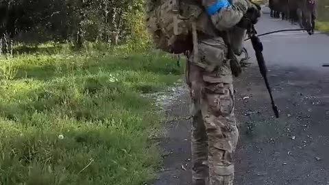 Ukrainians Providing Security and Clearing the Way As Even More Russians Surrender