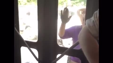 WOMAN SINGING BUS DOOR VINE