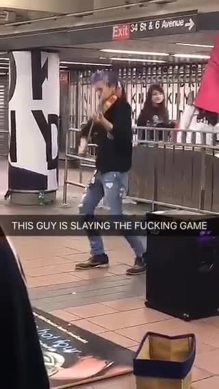 Guy purple hair black sweater jacket violin subway