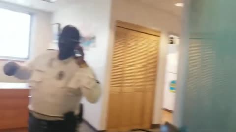 Anchorage city hall SECURITAS!! They let him CARRY a GUN!?!!...