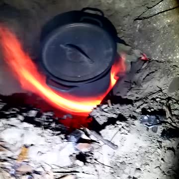Forced air sand stove.