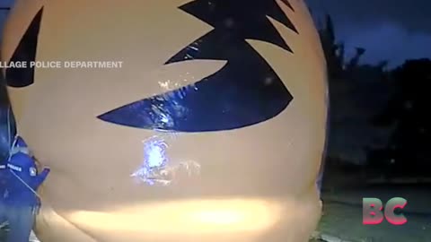 Ohio police officers swallowed up by giant Halloween decoration