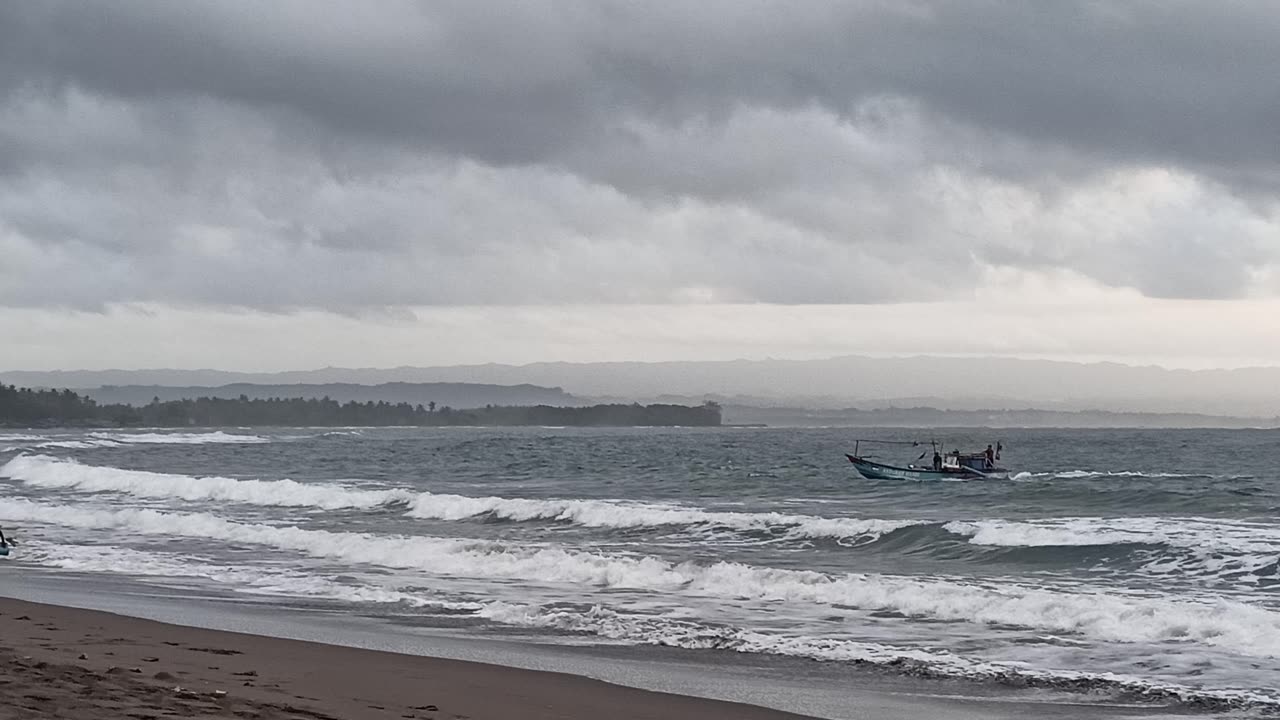 Fishing boat anchored on the beach