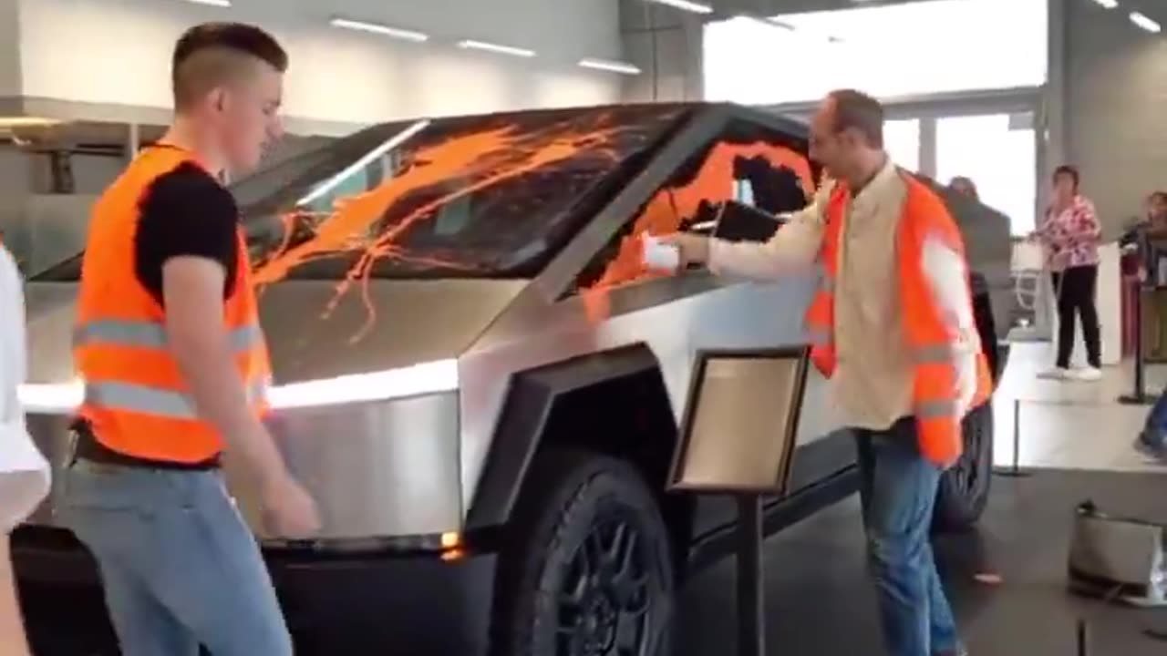 Climate activists attacking a Tesla Center in Hamburg, Germany