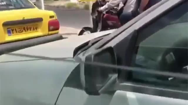 Woman wearing a hijab abuses another woman who was not wearing one.