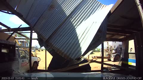 Sand Storm Rips and Removes Roof with Ease