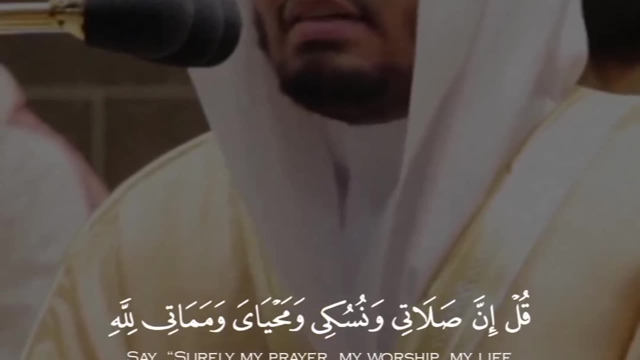 Heartfelt Recitation: A Man Reverently Reciting the Quran