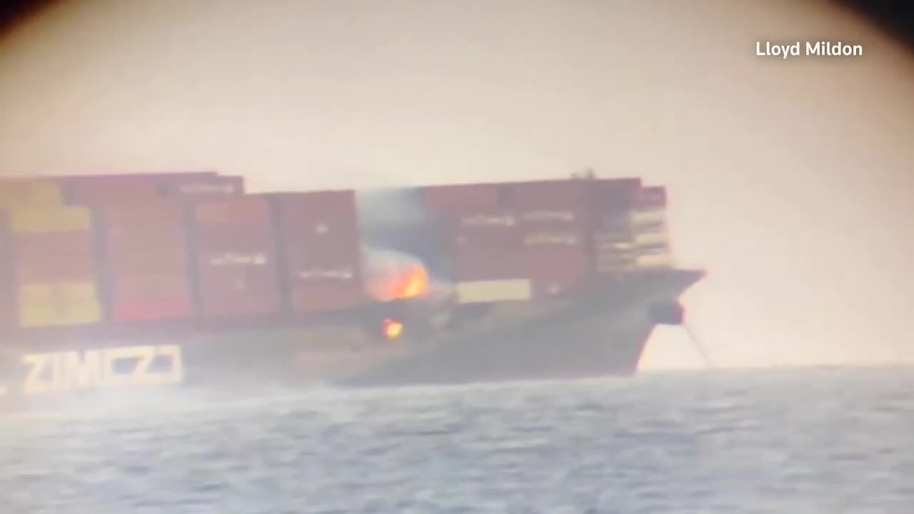 Reuters Fire blazes on cargo ship containers off Canada