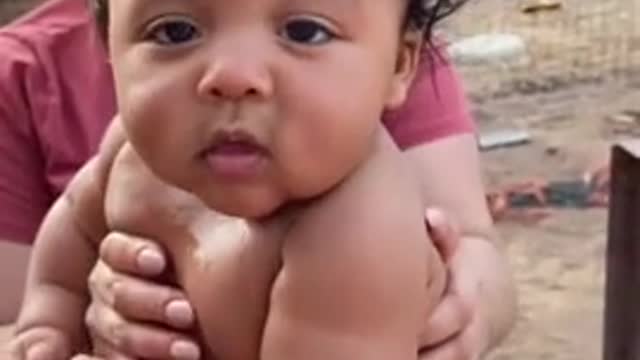 Exhilarated baby gets so excited to meet a horses