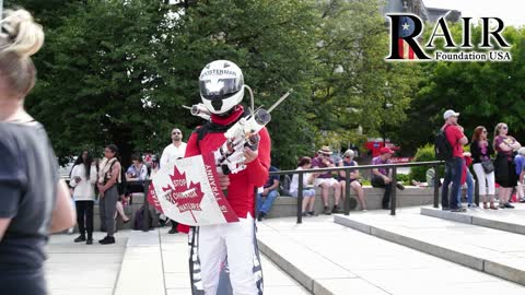 Booster Man: Costumed super-hero at James Topp arrival War Memorial