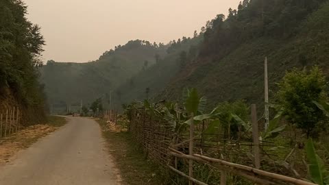 two children rides up high hill | baongocpungbanh