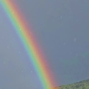 Beautiful rainbow in the rain / beautiful rainbow.