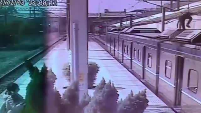 Train Climbing Passenger Zapped By High Voltage Lines