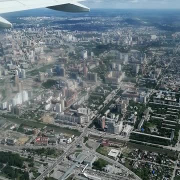 The plane makes a decline and prepares for landing.