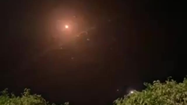 Palestinian rockets (right to left) intercepted over Tel Avi...