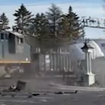 Driver makes lucky escape seconds before train CRASHES into truck