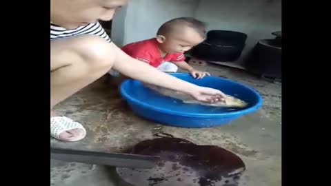 The baby cried to stop her from making fish