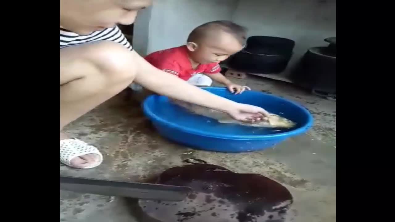 The baby cried to stop her from making fish