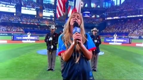 Ingrid Andress signing the national anthem at the home run derby