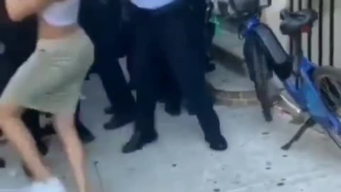 Degenerate Young Woman Slaps Cop, Gets Slapped Back