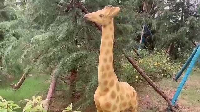 Encounter a cute giraffe statue