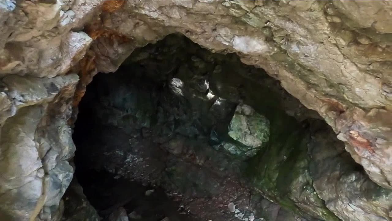 Exploring a Mysterious Cave in the Wilderness