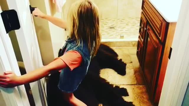 Massive Newfoundland completely blocks bathroom entrance