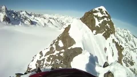 Skier takes a misstep and falls off cliff