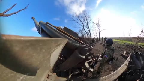 Grad MLRS crews and 2A36 Gyatsint-B howitzers