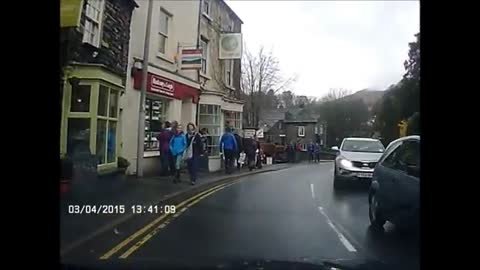 Lady Nearly Gets Hit Crossing The Road