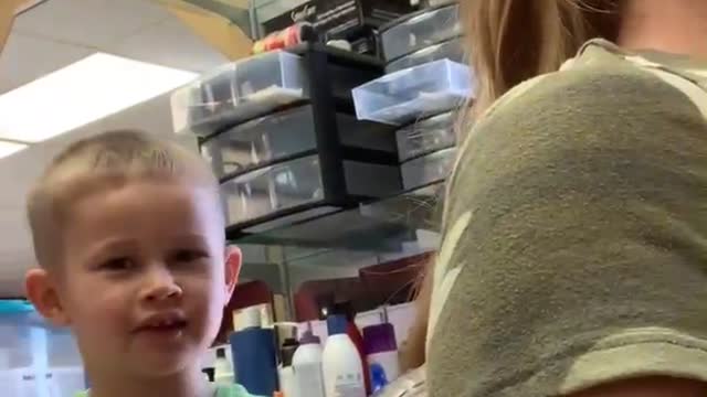 Comical 4 year old Hairdresser