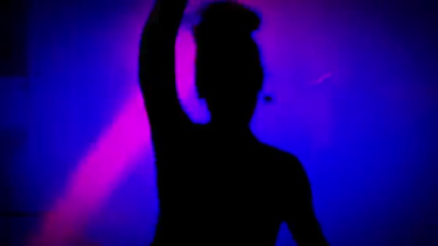 Dancing in a party with beautiful music.