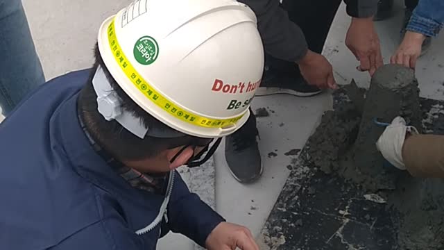 Concrete slump test.