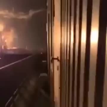 Oil Field refinery hit by attack Missle burns long hard an bright