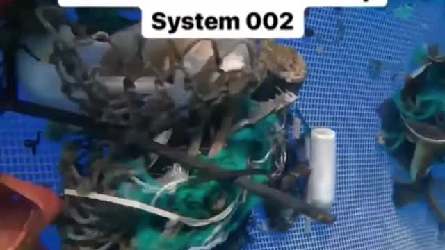 Underwater POV- how the Ocean Clean Up System 002 cleans the ocean