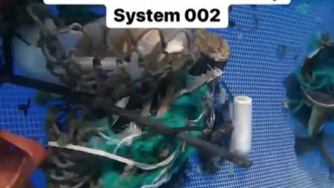 Underwater POV- how the Ocean Clean Up System 002 cleans the ocean