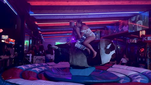 GIRL TAKE ON THE BULL! Benidorm Bull Ride. Mechanical Bull EPIC FAIL