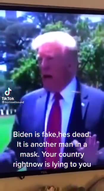 Trump Biden mask shot dead doesn't know he's alive