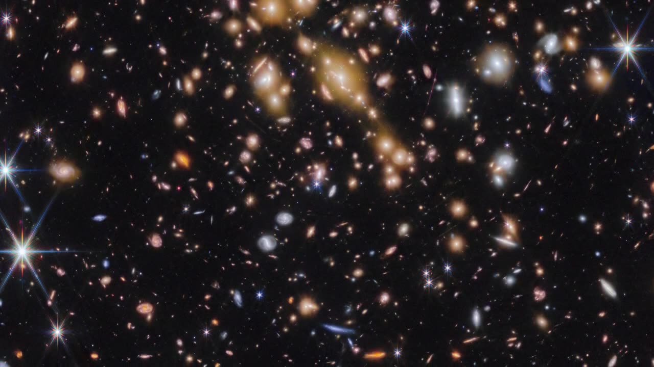 Pan of Cosmic Gems (galaxy cluster SPT-CL J0615−5746)